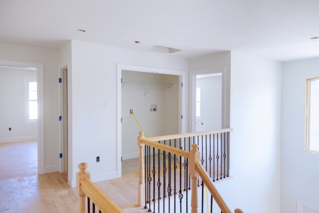 unfinished room of inside house under construction drywall tape